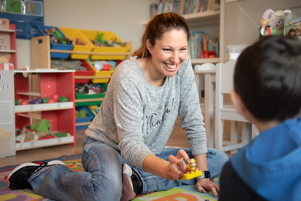 Early childhood educator working with a child