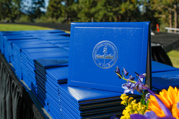 diplomas and flowers
