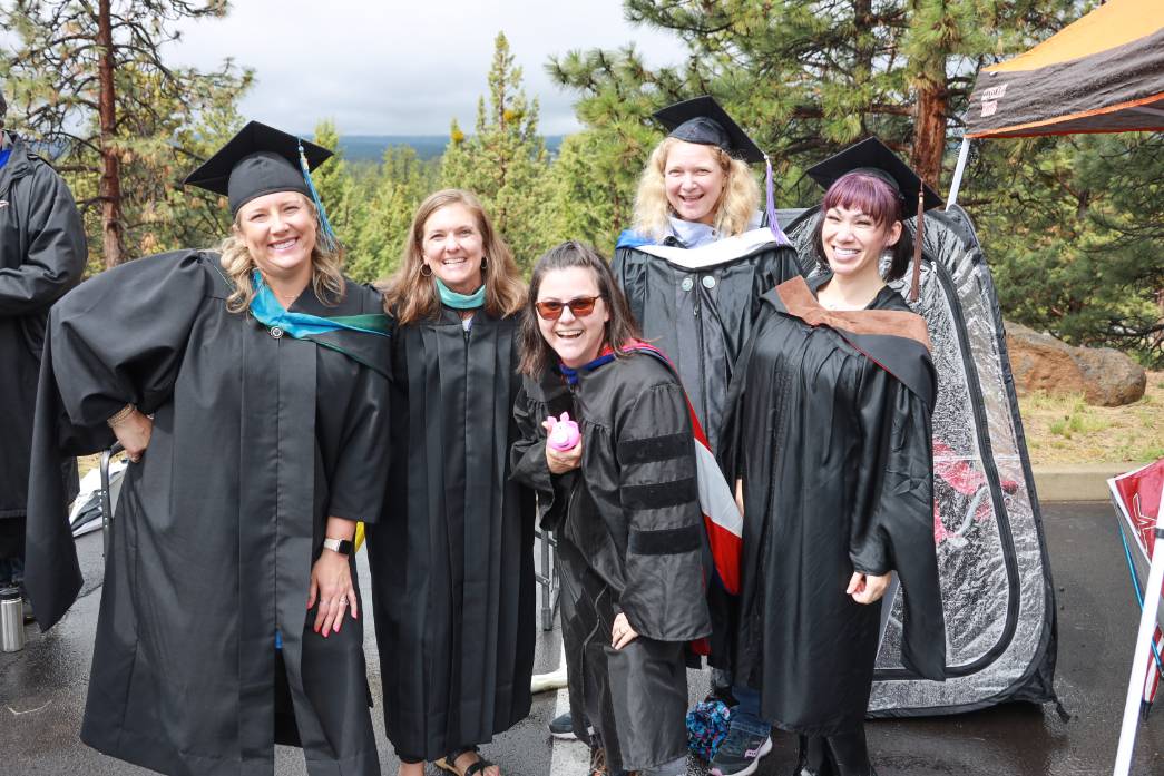 Several faculty celebrating at commencement