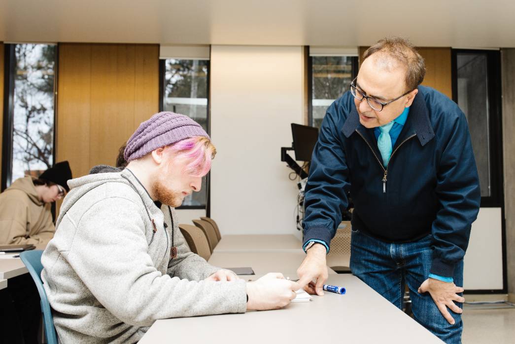 Professor helping a student