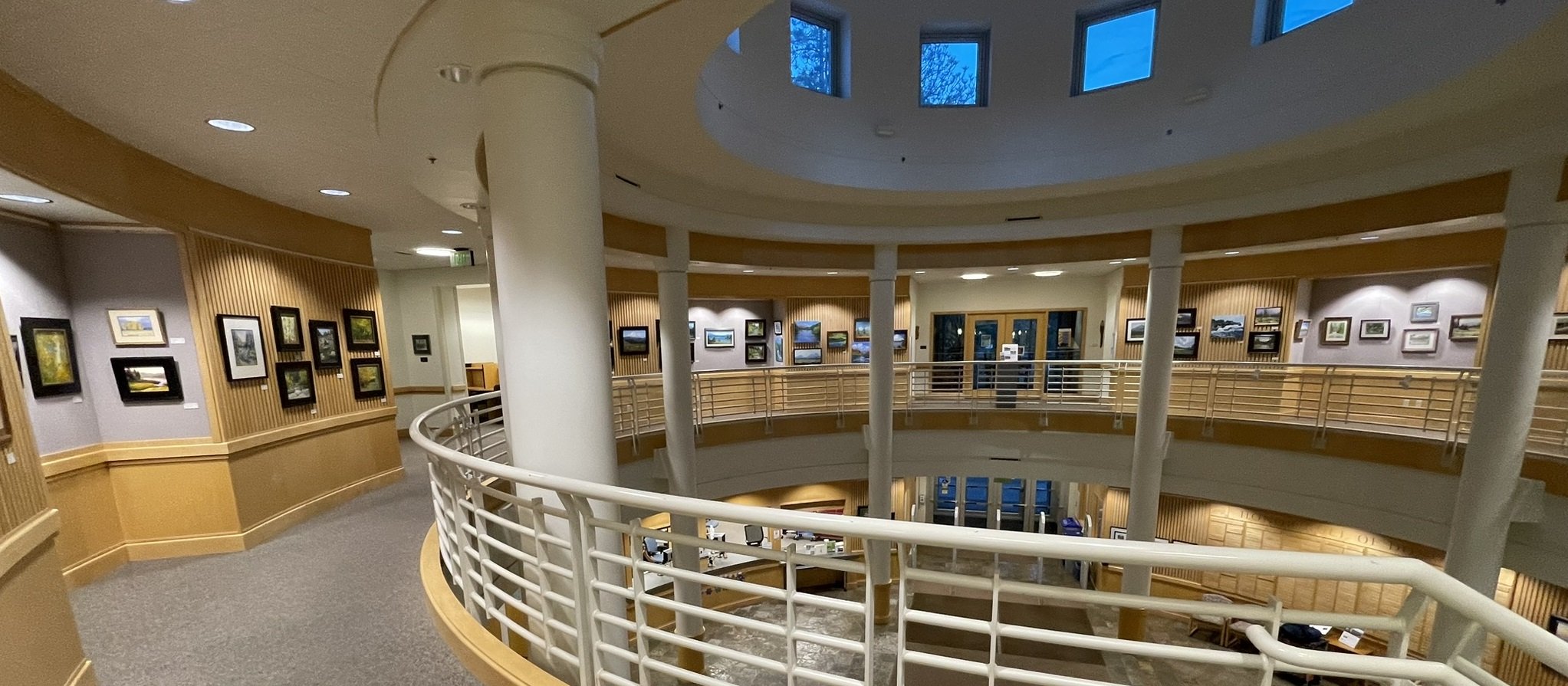 Wide view of the rotunda gallery. No art work is in focus.